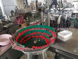 Antivirus tubular reagent filling, capping and labeling machine production line