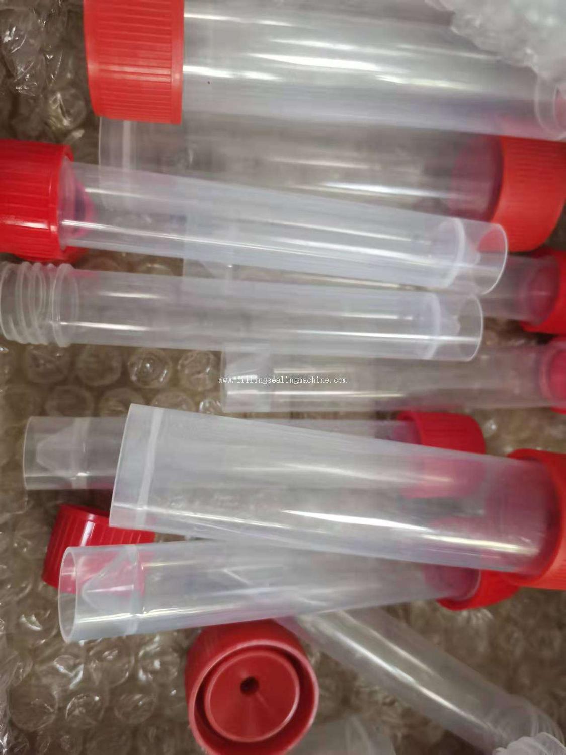 Small plastic tube bottle feeding    Antivirus reagent lotion cream filling sealing packaging mac.jpg